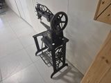 an old sewing machine that is on display in a room