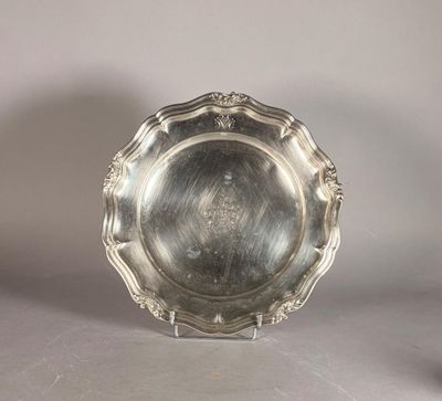 a silver plate that is sitting on a table