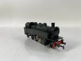 a toy train that is sitting on a white surface