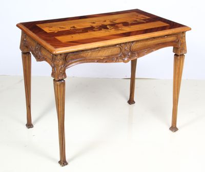 a wooden table with a wooden top on a white floor