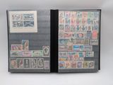 a lot of stamps on the cover of a book