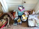 a pile of luggage sitting on the floor next to a door