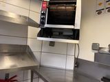 an image of a commercial kitchen with a toaster oven