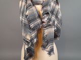 grey and white plaid scarf on a mannequin mannequin mannequin mannequin mannequin mannequin mannequin mannequin mann