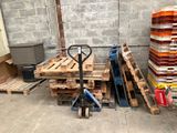 several pallets of wood are stacked on pallets in a warehouse