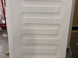 an image of a white chest of drawers in a room