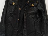 an image of a black jacket on a hanger on a white background