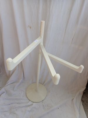 a picture of a white wooden display stand with four arms