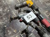 a lot of tools laying on the floor next to each other