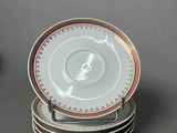 four plates stacked on top of each other on a table