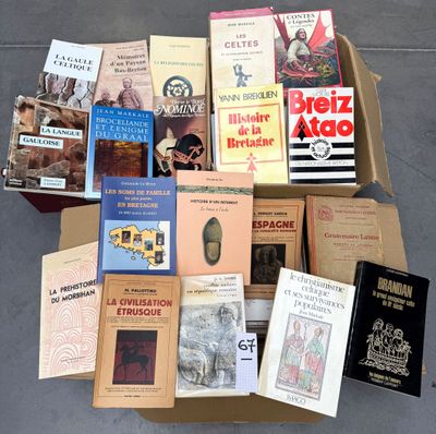 many books in a box on the floor
