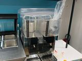 a picture of a coffee machine on a counter in a kitchen