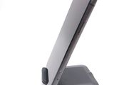 a close up of a cell phone on a stand
