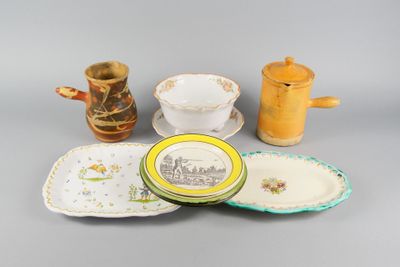many different types of plates and cups on the table