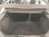 the back of a car with the trunk of a car in the back