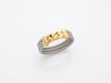 une bague en or jaune 18 carats et en acier inoxydable, de forme câble