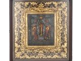 an old painting of a man and a woman in a gold frame