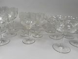 a lot of empty wine glasses on the table
