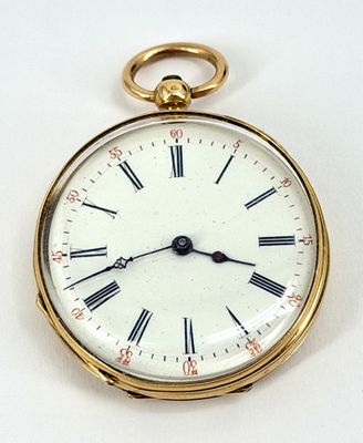 a gold pocket watch with roman numerals on the face