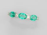 an emerald and diamond ring