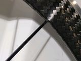 a close up of a bicycle tire with a black and white pattern on it