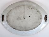 a white plate with a hole in the middle of it