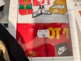 a picture of a box of nike socks and a pair of shoes