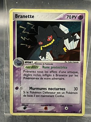 an image of a pokemon card with a picture of a bat