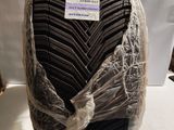 a picture of a cake that is wrapped in plastic