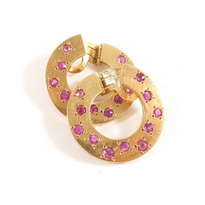 gold plated and pink crystal earrings on a white background