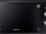 a close up of a microwave oven on a white background