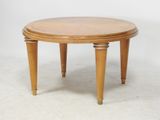 une image représentant une table en bois avec deux pieds et un plateau rond