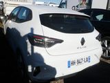 a white car that is parked in a parking lot