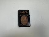 a lighter that has a picture of a horse on it