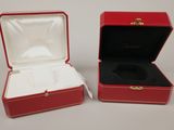 pair of red leather jewelry boxes with white lining and gold hardware