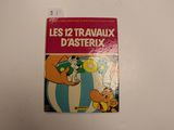 the cover of the book les 12 travaux d ' asterix