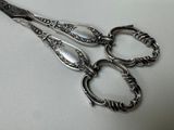 a pair of scissors that are sitting on a table