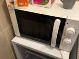 a microwave that is sitting on top of a counter