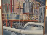 une photo d'une usine où l'on voit des tuyaux à perte de vue