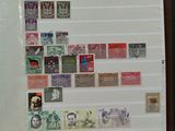 a lot of stamps on the pages of a book