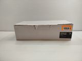 an open box of a white box sitting on top of a white table