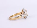 an image of a gold and diamond ring on a white background