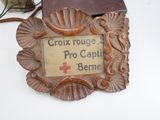 a picture of a wooden picture frame with a cross on it