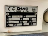 a sign on the side of a machine that says omc