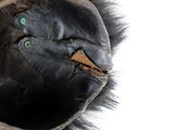 a close up view of a stuffed animal with its mouth open