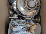 a box full of silverware and silverware in it