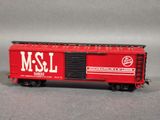a red train car with the word msl on it