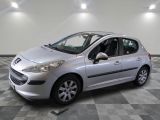 a picture of a silver car parked in a garage