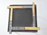 a picture of a black and white picture frame on a white wall