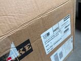 a cardboard box that is sitting on the floor